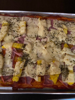 Una foto de Pizza de Cuarentena