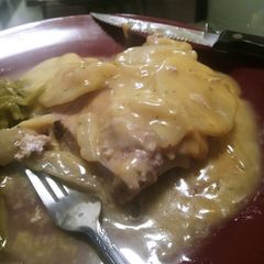 A picture of Smothered and Covered Pork Chops.