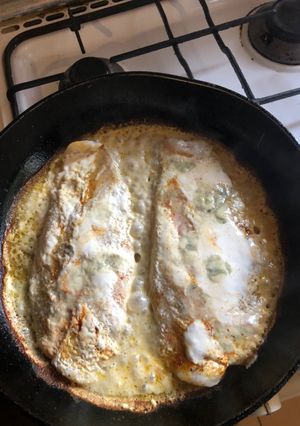 Una foto de Pescado con crema de leche y Roquefort