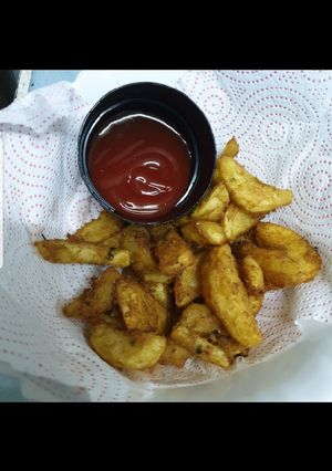 A picture of Fried wedges#4week challenge # idd challenge.