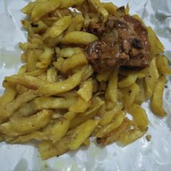 A picture of Fries with chicken.