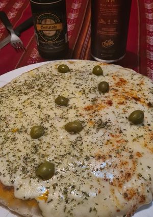 Una foto de Pizza, masa madre y todos los detalles