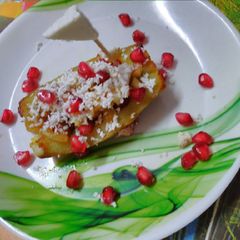 A picture of Sweet potato boat with fruits.
