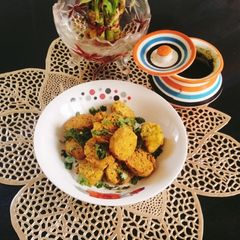 A picture of KOTHIMBIR VADI / Crispy kothimbir vadi.