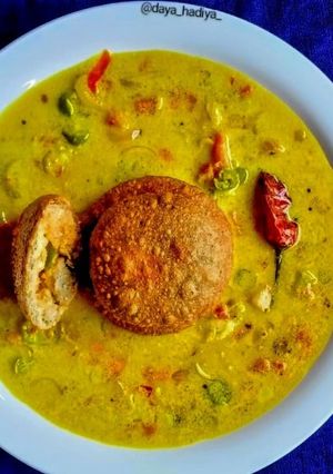 A picture of Millet cutlet in coconut greavy.