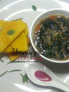 A picture of Yellow Yam and Moringa Sauce.
