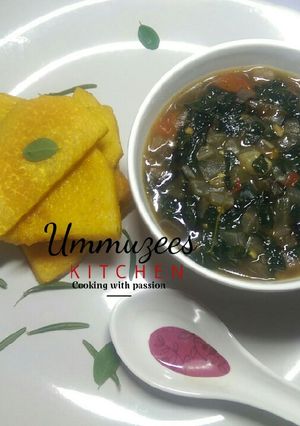 A picture of Yellow Yam and Moringa Sauce.