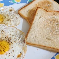 Sunny side up egg with toasted bread A picture of Sunny side up egg with toasted bread.