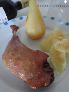 Una foto de Confit de pato con peras