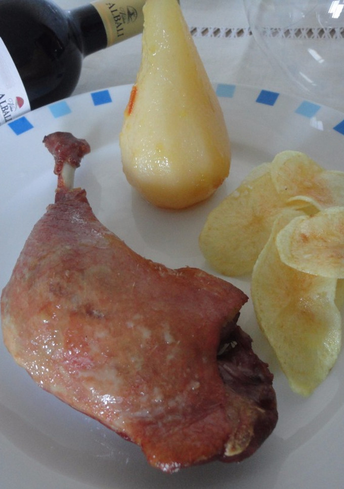 Una foto de Confit de pato con peras