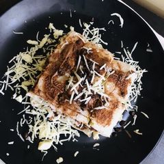A picture of Chocolate sauce cheese sandwich.