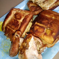 A picture of Toasted Bread With Eggs and grilled Chicken.