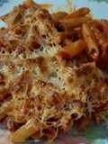Plumas integrales con tomate y chorizo