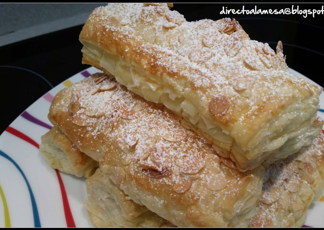 Cañas de hojaldre rellenas de crema pastelera
