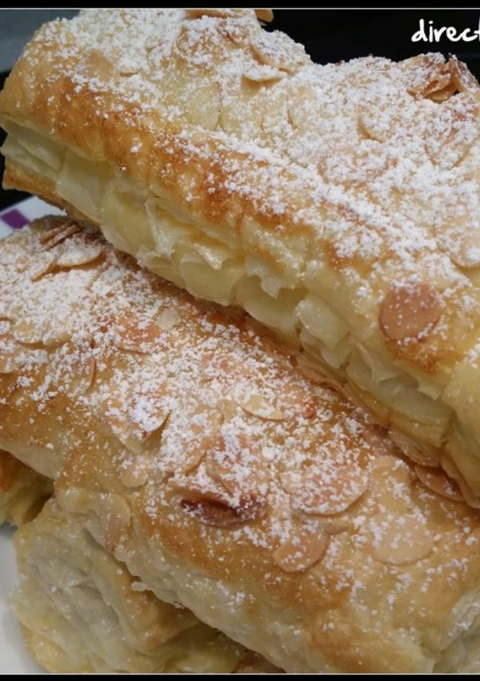 Una foto de Cañas de hojaldre rellenas de crema pastelera