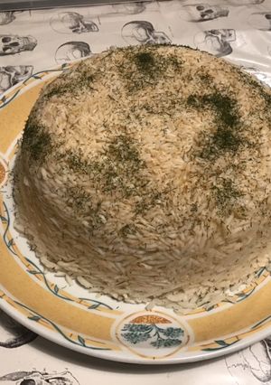 Une photo de Riz à l aneth et bouillon de gambas