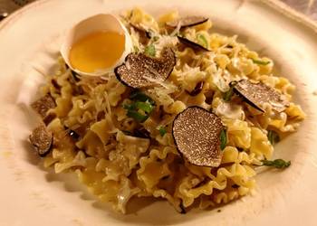 Easy Fast Cooking Truffle pasta served with raw egg yolk Restaurant Style