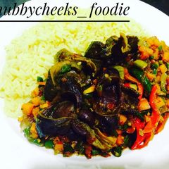 A picture of Gizzard sauce with curried rice.