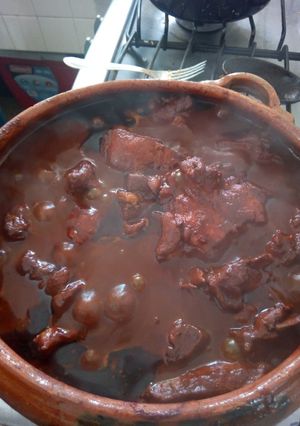 Una foto de Pollo y puerco a los 3 chiles