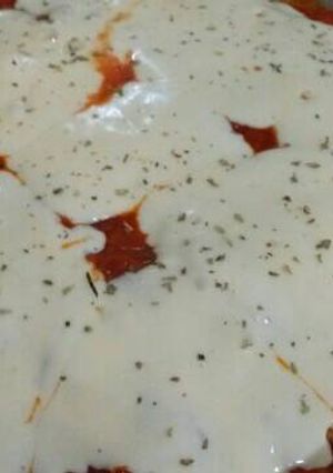 Una foto de Carne a la pizza