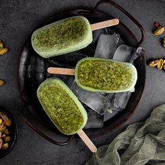 A picture of Vegan Matcha Pistachio Popsicles.