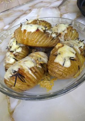 Una foto de Papas hasselback
