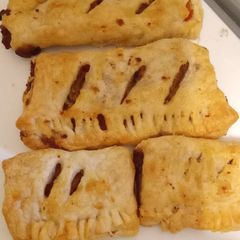 A picture of Airfryer Quorn sausage rolls, puff pastry. Vegetarian.