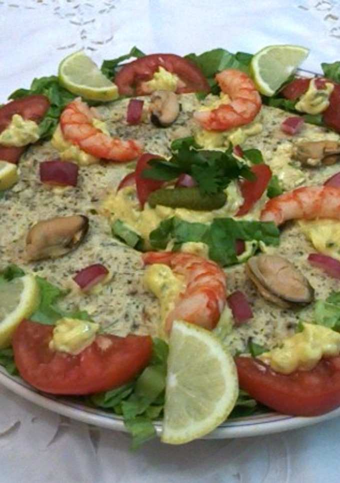 Una foto de Mousse de mariscos con salsa tártara 