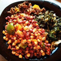 A picture of Stewed githeri with beef And greens.