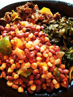 A picture of Stewed githeri with beef And greens.