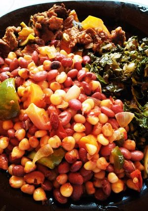 A picture of Stewed githeri with beef And greens.