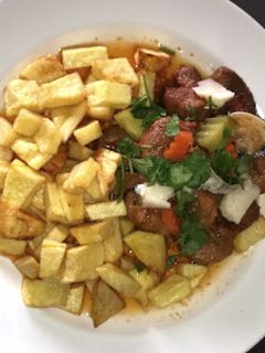 Foto de Carne de Porco à Alentejana