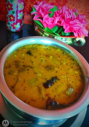 A picture of Mangalore cucumber huli(sambhar).