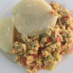 A picture of Yam and egg with carrot, pea.