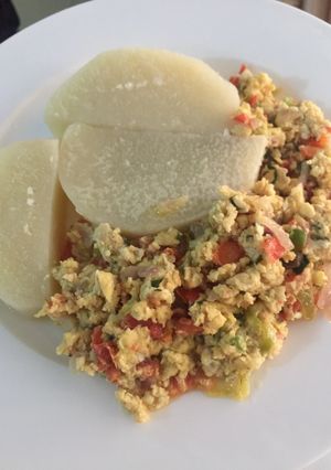A picture of Yam and egg with carrot, pea.