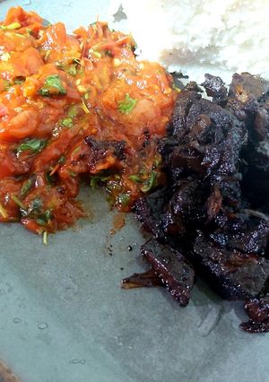 A picture of Sauteed liver with tomato stew.
