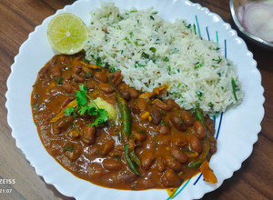 A picture of Restaurant Style Rajma Masala with Jeera Rice.