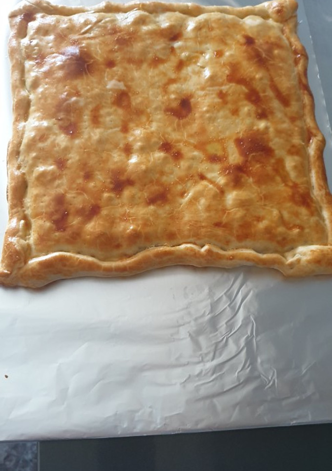 Una foto de Empanada de carne y pisto