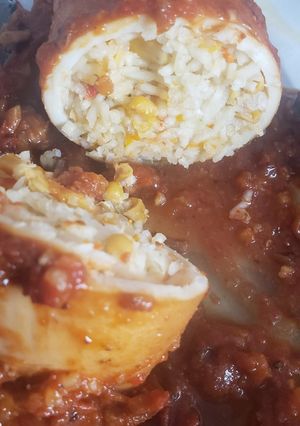 Una foto de CALAMARES RELLENOS con langostinos y arroz