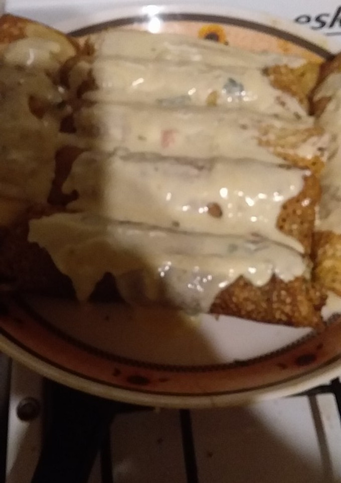 Una foto de Canelones, espinaca pollo y panceta masa de harina de garbanzo