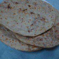 A picture of Sweet paratha/Tilachi poli.