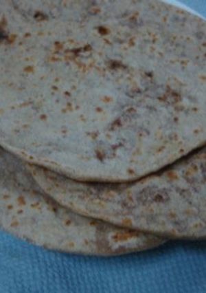 A picture of Sweet paratha/Tilachi poli.