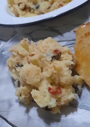 Una foto de Puré de papas con hongos y tomates secos