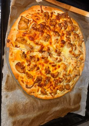 Une photo de Pizza au Poulet