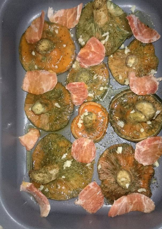 Una foto de Rovellons al horno con cerdo