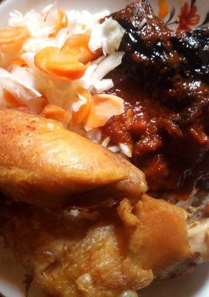 A picture of Rice, Stew with chicken and Cabbage.