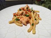 Una foto di busiate al pomodoro