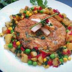 A picture of Omelette with spinach and chicken.