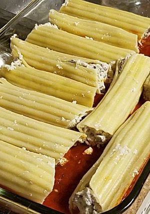 A picture of Cheese and beef manicotti.
