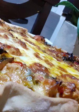 Una foto de Tarta cremosa de pollo y puerro